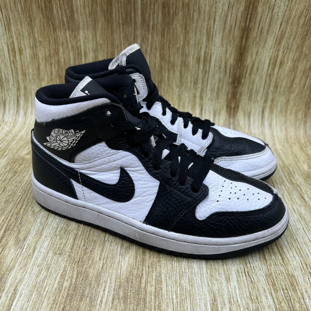 Jordan Women's Black and White High-Top Sneakers